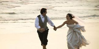 Couple at Beach During Wedding