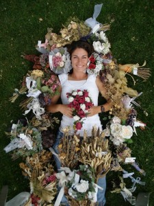 Jamie Johnson hold's the official Guinness World Record for the most bridal bouquets caught after catching 49 different bouquets since 1996. Photo: Jamie Johnson 