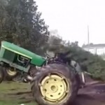 Man in Tractor Tries to Uproot Tree