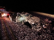 Car Hits Parked Semi Rolls Over in Tooele