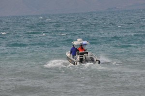 Rescue teams search for survivors in Monday's Bear Lake capsizing which killed four and injured three others. Photo: Utah Scanner/Twitter  