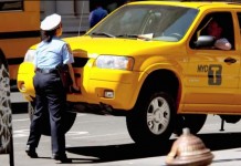 Video Shows Meter Maid Lifting 1.5-Yon Taxi