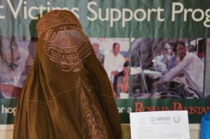 A women receives small business assistance from USAID's Conflict Victim Support Project. Photo courtesy of CVSP