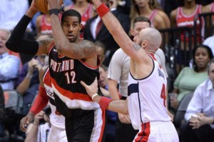 Portland Trail Blazers forward LaMarcus Aldridge (12) holds the ball against Washington Wizards center Marcin Gortat (4) in the second half at the Verizon Center in Washington, D.C. on March 16, 2015. Photo by Kevin Dietsch/UPI | License Photo