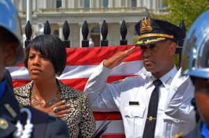 Baltimore Mayor Stephanie Rawlings-Blake, left, Baltimore Police Commissioner Anthony Batts attend an American flag event in August 2014. Rawlings-Blake announced Wednesday that Batts is being replaced as head of the police department. Photo: Baltimore Police Department/Facebook