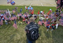 Marcus Vernell Praying at Chattanooga Makeshift Memorial