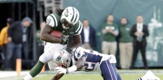 New England Patriots Devin McCourty tackles New York Jets Chris Ivory