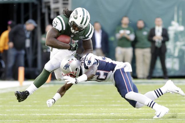 New England Patriots Devin McCourty tackles New York Jets Chris Ivory