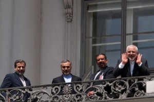 Iranian Foreign Minister Javad Zarif, right, Deputy for Legal and International Affairs of the Ministry of Foreign Affairs Abbas Araghchi, left, Hussein Feridun, second from left, the brother of Iranian President Hassan Rouhani, and negotiator Mohammed Niya, third from left, on balcony of the Palais Coburg Hotel where the Iran nuclear talks are being held in Vienna. Rouhani is planning a Monday evening address to the nation in a sign a formal deal is imminent. Photo by Ali Mohammadi/UPI
