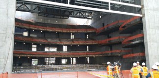 Salt Lake City Mayor Ralph Becker and Salt Lake County Mayor Ben McAdams celebrated 50 percent completion of the George S. and Dolores Doré Eccles Theater in the lobby of Neumont University today.