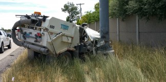 Street Sweeper Has Blowout and Collides with Pole on I-215