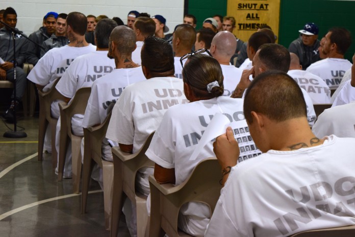 Football team visits prison
