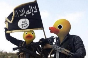 Members of the Reddit group 4chan have taken to editing ISIS propaganda images used online to portray members of the terrorist group as giant rubber ducks. Photo via anonymous/4chan