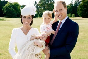 The Duke and Duchess of Cambridge, William and Kate Middleton, pose with their children, Prince George and Princess Charlotte, on the day of her christening on Sunday, July 5, 2015. Photo courtesy of The British Monarchy