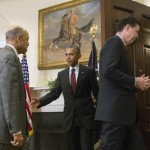 President Barack Obama escorts Homeland Security Secretary Jeh Johnson (L) and FBI Director James Comey (R) out of the Roosevelt Room after Obama delivered a statement on national security at the White House in Washington, D.C. November 25, 2015. Photo by Kevin Dietsch/UPI