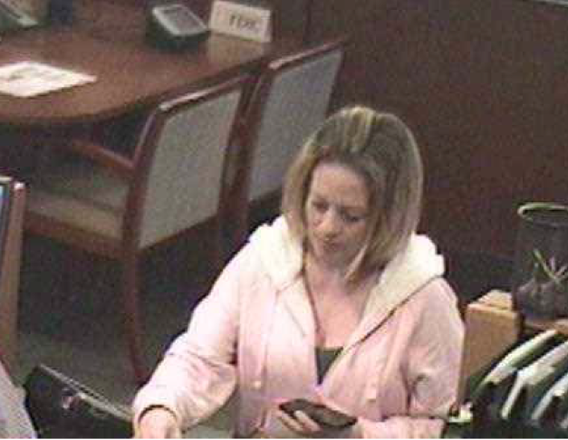 Identify Woman Cashing Fraudulent Checks