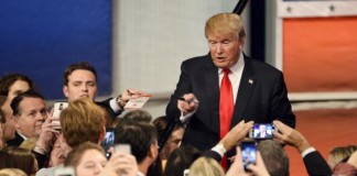 Trump-calls-for-mosque-surveillance-black-protester-assaulted-during-rally