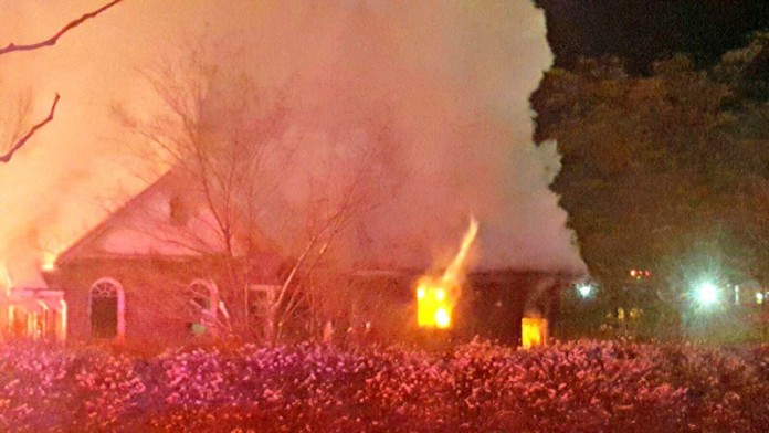 A fast-moving fire was reported at 11 p.m. Dec. 25 at 1880 Sycamore Lane, Holladay. Photo: Gephardt Daily staff.