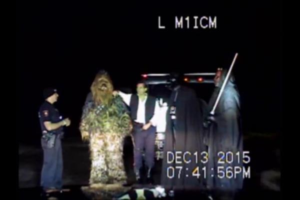 A Fulshear Police Department officer speaks with Star Wars characters after asking them to exit their vehicle. Fulshear Police/Facebook