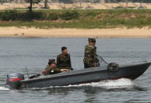 North Korean soldiers patrol the banks of the Yalu River near Sinuiju, across the Yalu River from Dandong, China's largest border city with North Korea. Pyongyang said Friday the United States has threatened "our people" for more than half a century with nuclear weapons. Photo by Stephen Shaver/UPI