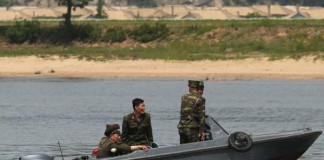 North Korean soldiers patrol the banks of the Yalu River near Sinuiju, across the Yalu River from Dandong, China's largest border city with North Korea. Pyongyang said Friday the United States has threatened "our people" for more than half a century with nuclear weapons. Photo by Stephen Shaver/UPI