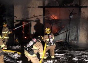 Crews in Ogden knocked down an early morning fire that destroyed a two-story garage Saturday morning. Photo Courtesy: Ogden City Fire Department
