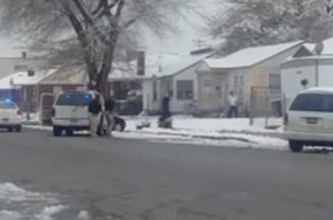 Salt Lake City Police in confrontation with man who was critically wounded in an officer-involved shooting Sunday. Photo: Facebook