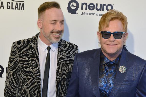 Elton John Hosts