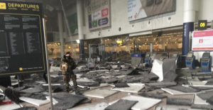 First responders on the scene of an apparent terror attack at the Brussels Airport where 13 are reported dead and more than 35 wounded, according to Belgium TV. Photo: Twitter 