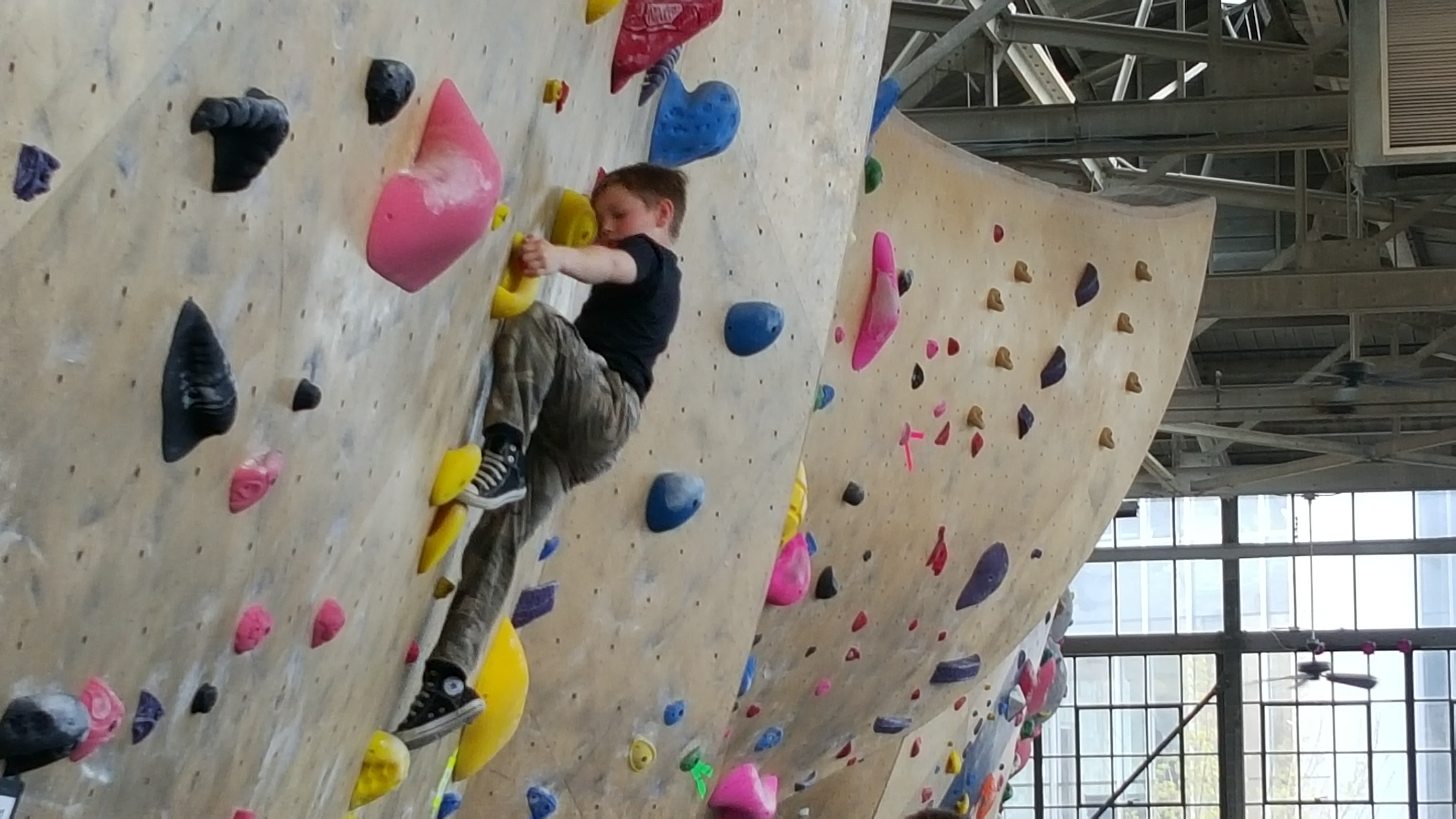 Lincoln Anaya, 7, works the wall at the 2016 Ogden Climbing Festival. Photo: Gephardt Daily