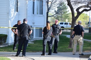 Salt Lake City police investigators on the scene of a homicide involving a 25-year-old woman found shot to death inside her apartment at 1621 W. Snow Queen Place, April 3, 2016. Photo: Gephardt Daily.