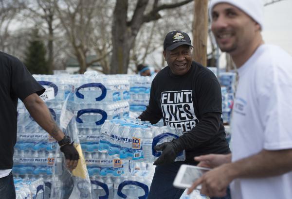 Three-officials-charged-in-Flint-Mich-water-crisis