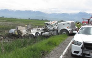 A truck driver died near Smithfield after rolling the semi he was driving. Photo Courtesy: Utah Highway Patrol