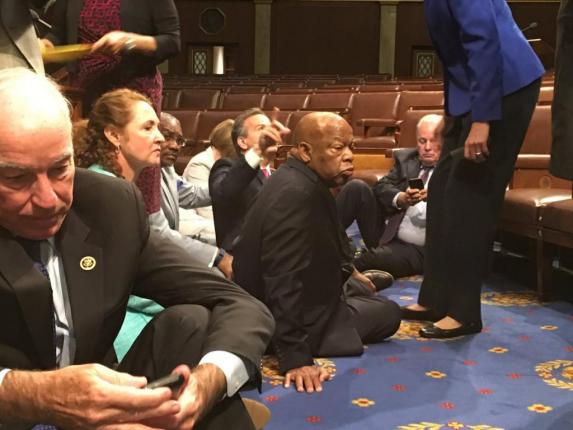 Democrats, led by Rep. John Lewis (C) stage a House sit-in in a bid to force action on gun control. Photo courtesy of Rep. John Yarmuth/Twitter