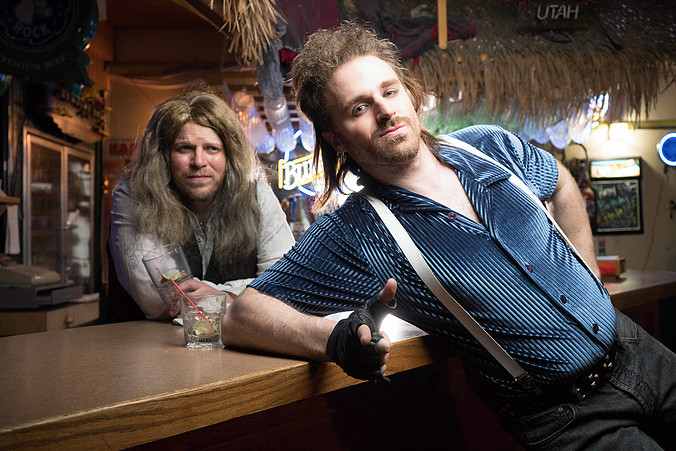 Daniel Akins (back) and J.J. Bateman play Dennis (now a blond) and Lonny in the Ziegfeld Theater's "Rock of Ages." Photo: The Ziegfeld Theater