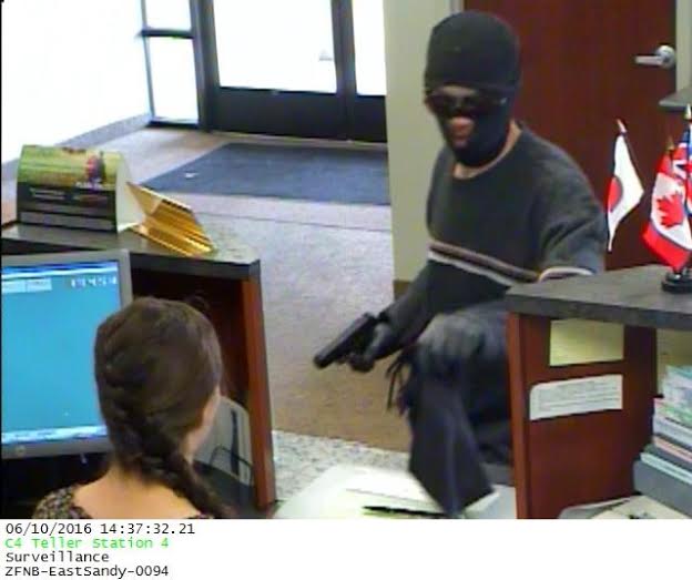 Two armed suspects wanted after Zions Bank robbery in South Salt Lake