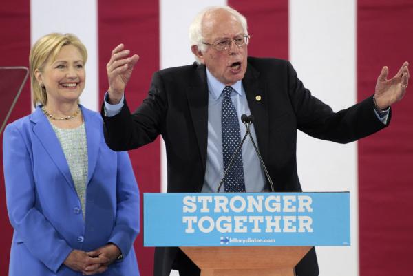 Sen. Bernie Sanders addresses the crowd while giving his formal endorsement to presumptive Democratic presidential nominee Hillary Clinton during a rally in Portsmouth, N.H., on Tuesday. Photo by Matthew Healey/UPI