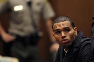 Musician Chris Brown appears in court with his attorney Mark Geragos for a probation progress report hearing in Los Angeles in 2013. Brown had pleaded guilty to assaulting his girlfriend, singer Rihanna, in 2009. File Photo by David McNew/UPI/Pool 