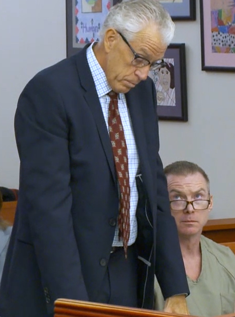 Craig Crawford is accused in the May 22 death of his estranged husband, John Williams. Crawford is shown here with his attorney, James Bradshaw. Photo: Pool