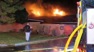 Firefighters responding to the scene of an early morning fire at 735 East Three Fountain Circle in Murray. Photo: Gephardt Daily