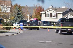 West Jordan police investigators on the scene of an officer-involved shooting near 8880 South 1095 West, Nov. 2, 2016.