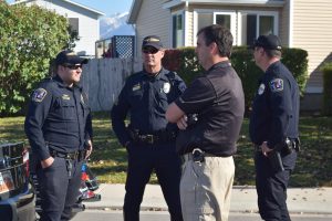 West Jordan police investigators on the scene of an officer-involved shooting near 8880 South 1095 West, Nov. 2, 2016.