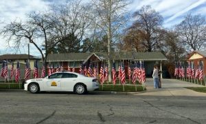 Flags surround the Box Elder County home of critically injured Utah Highway Patrol Trooper Eric Ellsworth, Sat. Nov. 19, 2016. Photo: Gephardt Daily/Utah Highway Patrol