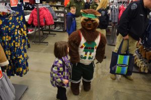 Utah Valley University mascot Wille the Wolverine joins Unified District police and firefighters with helping kids shop for clothes and footwear by way of the Unified for Families project, Dec. 17. 2016. Gephardt Daily