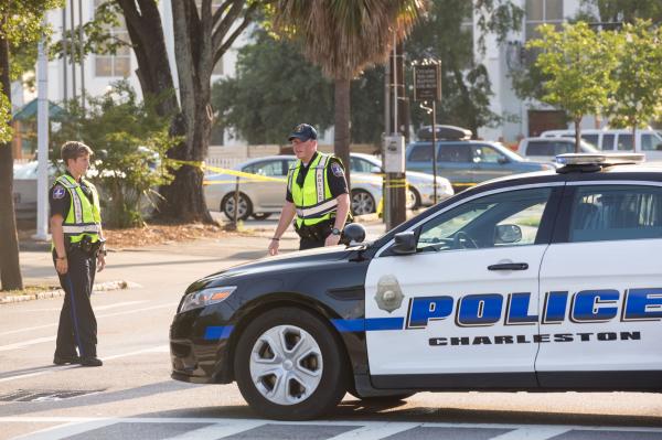Police officers secure Calhoun Street in Charleston, S.C., on June 17, 2015, after 22-year-old Dylann Roof opened fire on a prayer meeting at the Emanuel AME Church and killed nine people at the historic black church. Roof was convicted Thursday on federal hate crimes charges related to the attack, and faces a possible death sentence. File Photo by Richard Ellis/European Pressphoto Agency
