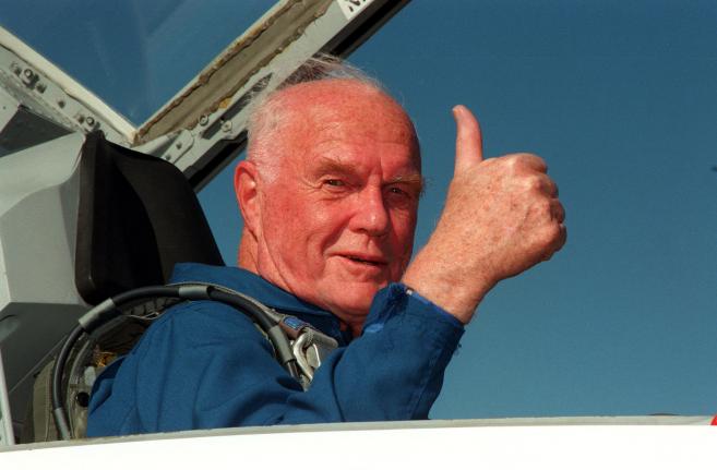 Space Shuttle Discovery astronaut John H. Glenn, Jr., gives a thumbs up on his arrival at Kennedy Space Center’s Shuttle.Landing Facility aboard a T-38 jet in October 1998, when he became the oldest person to fly in space. UPI Photo/File