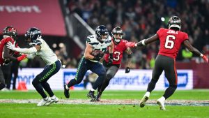 Utah linebacker Cody Barton runs a drill at the NFL football