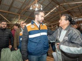 Eduardo Leite, governor of Rio Grande do Sul, meets with people displaced from their homes at a shelter while surveying the aftermath of an extratropical cyclone in southern Brazil. Photo courtesy of Gov. Eduardo Leite/Twitter