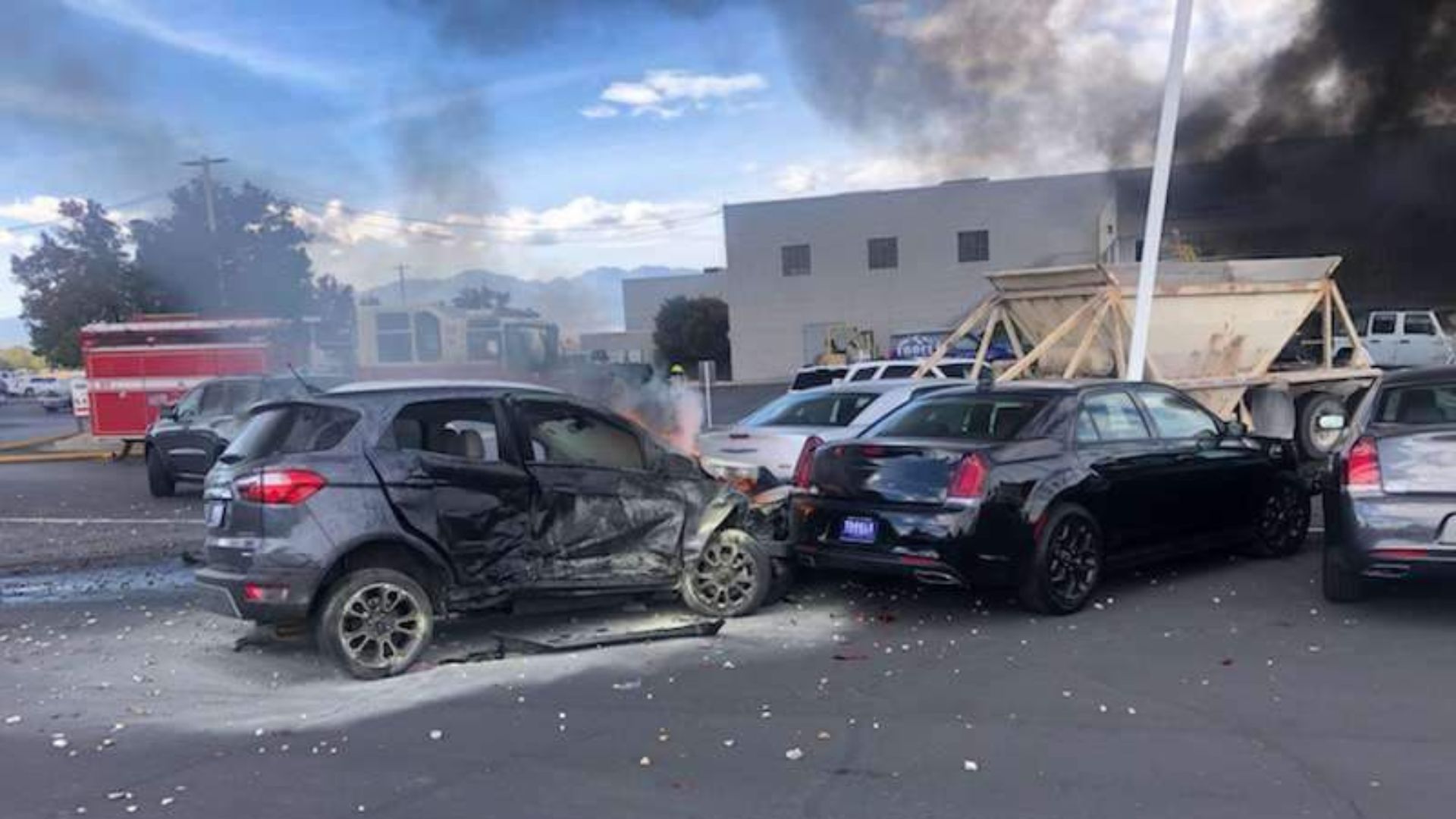 27 vehicles damaged in fiery semi-truck crash at Tooele car