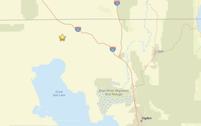 Map showing a yellow star pin marking a point of interest west of I-84 near the Great Salt Lake in Utah.